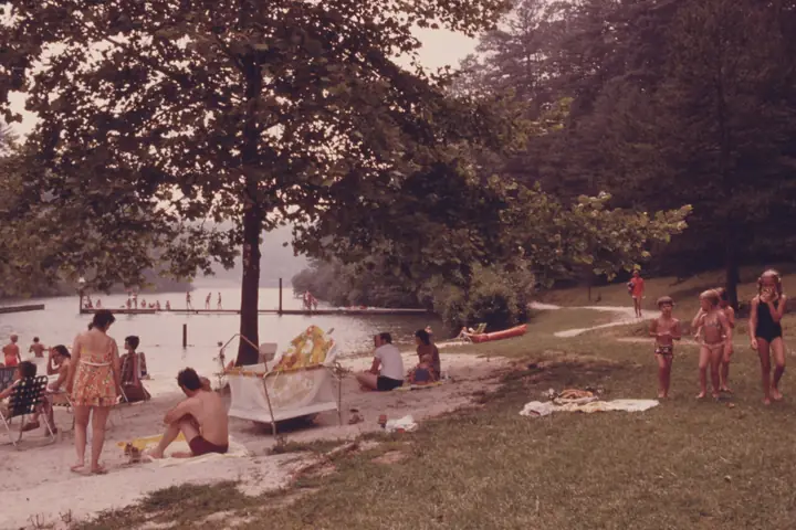 A crowded lake beach on the Fourth of July